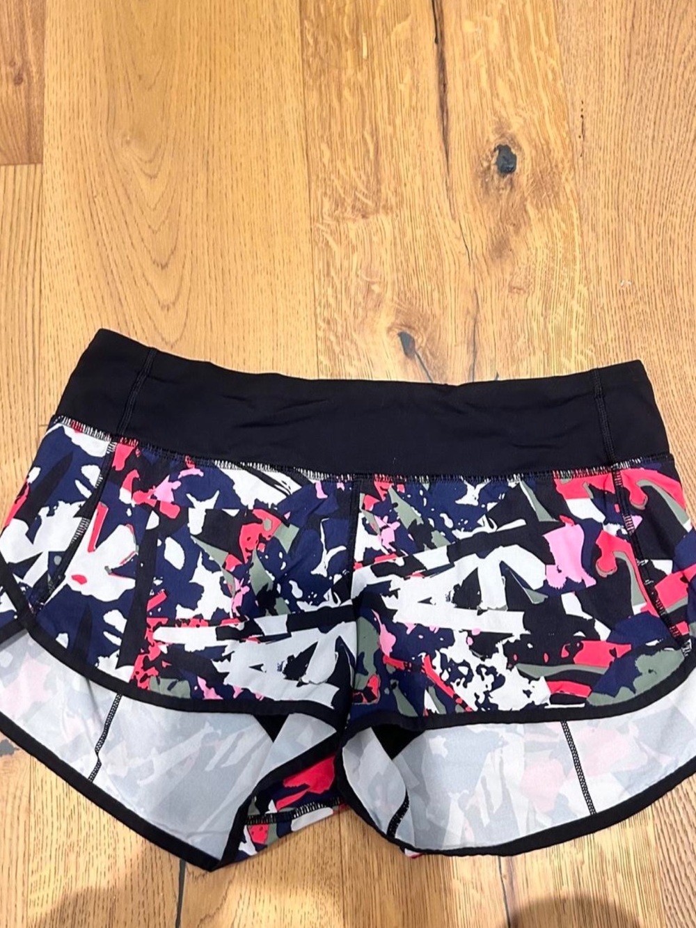 Lululemon Black Athletic Shorts with Multicolor Abstract Print Size 6
